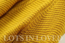 秋日暖意，經典重生——品味大翻領粗棒針羊毛衫的溫暖時尚